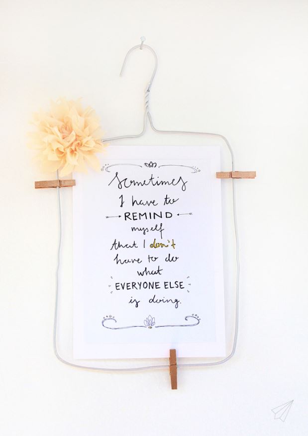 Turn a wire hanger into a picture frame